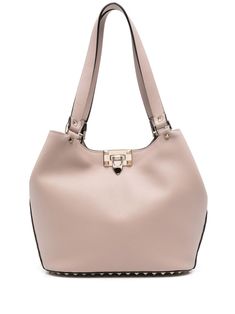 powder pink calf leather pebbled texture signature Rockstud detailing logo-engraved gold-tone hardware internal logo stamp clasp fastening/lobster claw fastening two flat shoulder straps main compartment internal patch pocket leather lining This piece comes complete with a protective dust bag. This item is in size UNI and the color is Pink Luxury Pink Saffiano Leather Bag, Valentino Pink Bag, Valentino Handbags Pink, Silver Valentino Bag, Valentino Rock Stud Bag, Leather Tote Bag Women, Medium Sized Bags, Leather Cap, Powder Pink