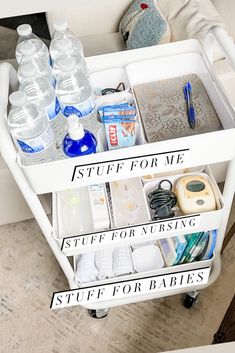 a white cart filled with water bottles and other items