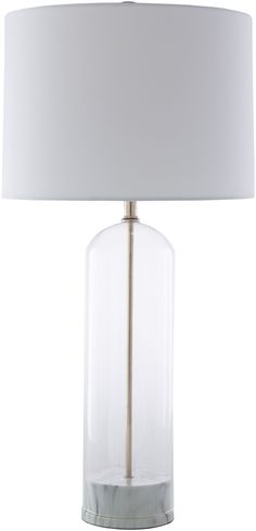 a clear glass table lamp with a white shade on the bottom and a silver base