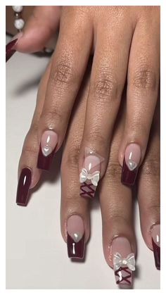 Indulge in the rich, romantic hue of cherry wine nails, perfect for adding a touch of sophistication to any look, day or night. Maroon Nails Simple, Dark Maroon Nails Design, Maroon Nails With Design, Sweet Sixteen Nails, Maroon Nail Designs, Maroon Nail, Nails Bow