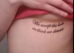 a woman with a tattoo saying we accept the love, we think we're done