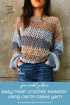 a woman standing in front of a wall with her hands on her hips wearing a crochet sweater