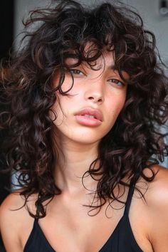 40 Trendsetting Medium-Length Layered Haircuts for 2024 - The Hairstyle Edit Dramatic Layers Curly Hair, Medium Length Haircut Layers Wavy, Layered Curls Medium, Wavy Brown Hairstyles, Rocker Curly Hair, Curly Haircut Woman, Haircut For Medium Length Hair Layered, Curly Hair Cuts Medium Length Layers, Curly Hair Volume Haircut