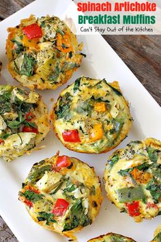 spinach artichoke breakfast muffins on a white plate