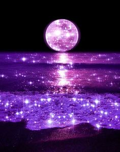 the moon shines brightly in the night sky over the water and beach with stars on it