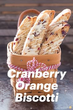 cranberry orange biscotti in a basket with the words, cranberry orange biscotti