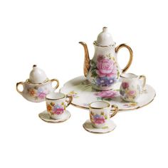 an assortment of tea cups and saucers