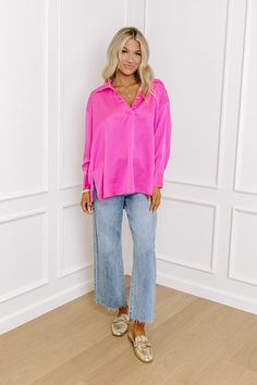 – Simple and stunning for a sweet night out – Lightweight, soft textured material – V-cut, collared neckline – Long, loose sleeves with button closure cuffs – Relaxed, flattering silhouette that ends in a straight upper-thigh hemline Oversized Long Sleeve Pink Blouse, Chic Pink Blouse For Fall, Chic Pink Fall Blouse, Pink V-neck Blouse For Night Out, Relaxed Fit Pink Blouse For Fall, Pink Relaxed Fit Blouse For Fall, Chic Pink Relaxed Fit Blouse, Chic Pink Blouse With Relaxed Fit, Pink Collared Solid Color Blouse