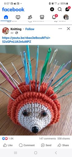 a crocheted hedgehog toy with lots of needles on it's head