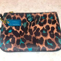 Nwot Coach Wristlet Brown Animal Print With Teal Accents This Was Never Used But Given As A Gift So It Did Not Come With Original Tags It Is Beautiful And Perfect For A Night Out Make An Offer Coach Blue Wristlet For Travel, Blue Coach Pouch Wristlet, Coach Blue Pouch Wristlet, Coach Multicolor Travel Wristlet, Coach Multicolor Wristlet For Travel, Multicolor Coach Wristlet For Travel, Blue Coach Wristlet For Daily Use, Coach Blue Wristlet For Daily Use, Teal Accents