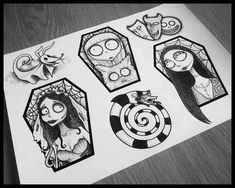 some cartoon characters are drawn in black and white on a piece of paper with markers