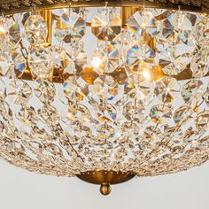 a crystal chandelier hanging from the ceiling