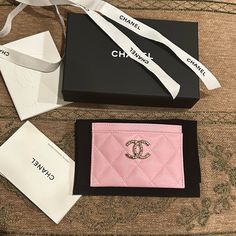 the chanel wallet is in its original box and it's still in its packaging