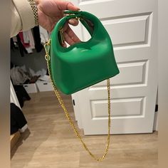 Never Used. Bright Green Color. Comes With Dust Bag Green Rectangular Bucket Bag With Zipper Closure, Green Rectangular Bucket Bag With Zipper, Green Bags With Chain Strap For Daily Use, Green Bag With Chain Strap For Daily Use, Trendy Green Bucket Bag With Zipper Closure, Green Rectangular Bucket Bag For Evening, Top Handle Bags With Chain Strap For Shopping, Chic Bags With Chain Strap For Errands, Shopping Bags With Chain Strap And Top Handle