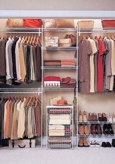 an organized closet with clothes and shoes