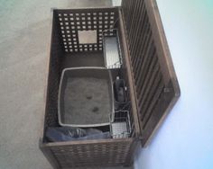 a brown basket that has some items in it