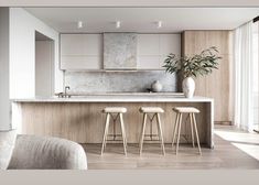 a kitchen with three stools in front of an island countertop and two potted plants