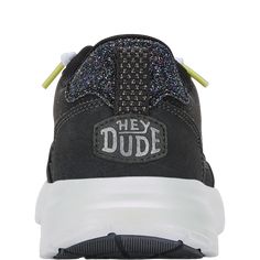 HEYDUDE | Women's Sneakers | Sirocco Alta Glitter Shine - Black | Size 7 - Athleisure reaches all new heights in Sirocco Alta Glitter Shine. We mixed our classic mesh top in with an elevated metallic faux leather toe bumper and heel to see fashion meet function. Throw in heel loops for easy pull-on and lateral stitch cage detailing and these shiny sneaks will stay on foot all day long.Shoe Specs: Slip-On Stretch Lace Mesh top Synthetic toe bumper and heel Padded tongue, collar and heel counter E Sporty Glitter Sneakers For Streetwear, Casual Sneakers With Glitter Accents For Streetwear, Casual Glitter Sneakers For Streetwear, Sporty Sneakers With Glitter Accents For Streetwear, Casual Sneakers With Glitter Print, Sporty Sneakers With Glitter Accents, Casual Glitter Print Sneakers, Glitter Print Lace-up Sneakers For Streetwear, Sporty Low-top Glitter Sneakers