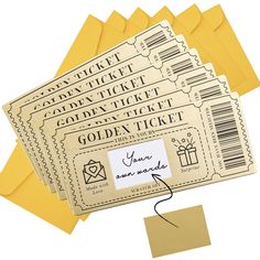 the golden ticket is next to some yellow envelopes