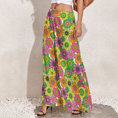 Wide Leg Pants, Retro Pants, Wide Leg Pants Women, 70s Style Pants, 70s Inspired pants, Neon Pants, Floral Pants, Hippie Pants, Boho Pants Designed in California, Handmade to order from overseas I designed this for those who loves the 70s boho hippie style. Super cute neon floral print. I am designing a matching top as well. Great for every day wear or at the beach or any fun parties. Pair it with platform chunky heels, for a super funky style. Hope you enjoy my designs.  Material: Made of 100% Vintage Non-stretch Wide Leg Pants, High Waist Hippie Pants For Spring, Retro Wide Leg Bottoms For Spring, Retro Wide Leg Pants For Spring, 70s Inspired High Waist Bottoms For Spring, Retro Non-stretch Trousers, Retro High Waist Beach Bottoms, Retro Wide-leg Bottoms With Elastic Waistband, Retro Wide Leg Bottoms With Elastic Waistband