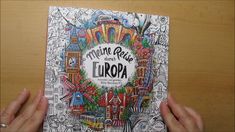 a person holding up a coloring book with the title'monterobe in europe '