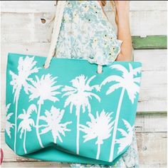 This Beautiful Vibrant Deep Aqua Mint Color Beach Tote Is The Perfect Bag To Take To A Family Vacation Or Beach. Features A Large Capacity With A Zippered Closure. Has An Inside Lining With A Pocket Pouch And Soft Cream Braided Rope Straps. You Can Fit A Lot In This Bag. It Has A Palm Tree Print On The Front And Solid Color On The Back. 100% Polyester. Measurements 20.5" X 14.2" X5 5" Love The Quality Of This One!!! Great Style And Sooo Pretty, Your Not Gonna Want To Pass This One Up Spring Vacation Beachy Beach Bag, White Summer Bag For Poolside, White Bag For Poolside Summer Use, White Bag For Poolside Summer, White Bag For Poolside Summer Days, White Summer Poolside Bag, Beachy Beach Bag For Summer Vacation, White Beachy Beach Bag For Day Out, Beachy Bag For Summer Outings And Vacation