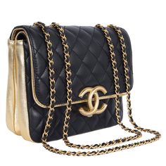 Authentic, pre-owned Chanel double flap quilted lambskin leather shoulder cross body bag in black. Features quilted leather with gold accent leather, gold hardware, a long gold chain strap with leather insert, front clasp closure. The interior features gold lambskin leather, double flap with snap closure, featuring large pockets with zipper and slip pocket. This bag is a Classic that you will love. Add your small cosmetic case, wallet, phone, keys, and more. Authenticity card and stamp read: 281 Chanel Double Flap, Vanity Case, Cosmetic Case, Quilted Leather, Flap Bag, Lambskin Leather, Gold Accents, Gold Hardware, Chain Strap