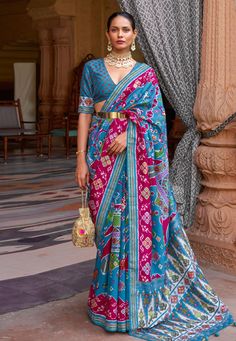 Patola silk print Saree in Sky blue colour 348C Desc: Saree Style : Patola Sarees Saree Color : Sky Blue Fabric : Patola Silk Work : Printed Wash Care : Dry clean Sleeve Style : Half Sleeve Long Sleeves : Done only in Custom Stitch Sleeves Lining : Done only in Custom Stitch Bust Size : 32 to 42 Inches Occasion : Festival Diwali Eid Durga Pooja Ganesh Charturthi Dussehra. With Express Free Shipping Buy Indian Party wedding wear Bridal Sarees Patola silk print Saree in Sky blue colour 348C online Orang India, Blue Silk Saree, Designer Sarees Wedding, Saree Bollywood, Patola Sarees, Patola Saree, Indian Designer Sarees, Designer Silk Sarees, Saree Designs Party Wear