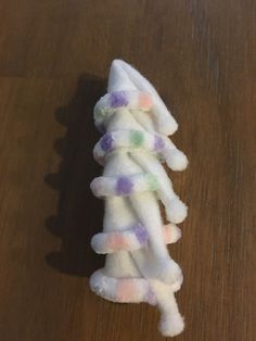 a pile of white stuff sitting on top of a wooden table