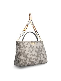 Elevate your style game with this chic chenille shoulder bag, beautifully adorned with a dark gray FF tapestry motif. The real standout is its metal maxi O'Lock logo on the chain, giving it a unique visual appeal. Handcrafted in Italy, this bag is a perfect blend of style and substance - ensuring your essentials are secured in style. Features a Fendi Roma inscription in metal Securely closes with a zipper Suede-lined interiors for a touch of luxury Includes a button pocket and two flat pockets f Lock Chain, Fendi Handbag, Chain Crossbody Bag, Leather Cap, Metal Accessories, Mens Gloves, Beach Tote Bags, Fendi Bags, Elevate Your Style