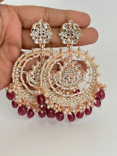 Rose Gold Bollywood Stone Kundan Earrings pearl Earring/Pakistani Earrings/Statement Earrings/Long chandelier/bridal/Indian wedding Length: 3.6 Inches; Width: 2.5 Inches Materials: Brass Arrives in a gift box Color, shades, texture displayed may slightly vary from the actual product due to digital image limitations. We request you to consider these minor variations. Please expect the possibility of some slight imperfections when buying handmade jewelry. If you have any questions, please contact us. Luxury Stone Work Earrings For Diwali, Luxury Kundan Chandelier Earrings For Wedding, Luxury Multicolor Temple Bridal Earrings, Luxury Gold Kundan Chandelier Earrings, Trending Earrings, Bridal Indian, Pakistani Earrings, Long Chandelier, Statement Chandeliers