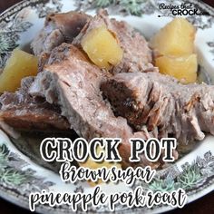 crock pot brown sugar pineapple pork roast on a white and green floral plate