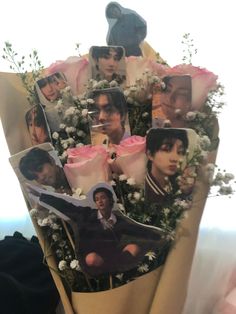 a bunch of flowers with pictures on them