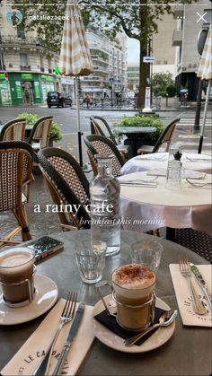 a table with plates, cups and silverware on it