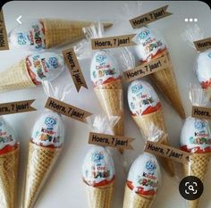 ice cream cones are wrapped in plastic and labeled with names for each individual item,