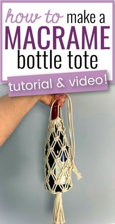 Person holding up a macrame bottle holder against a gray backdrop Macrame Water Bottle Holder Pattern, Macrame Bottle Holder Diy, Macrame Tutorial Video, Wine Bottle Macrame, Macrame Bottle Holder Tutorial, Macrame Water Bottle Holder Diy, Macrame Patterns Beginner Step By Step, Macrame Wine Bottle Holder, Wine Bottle Holder Diy