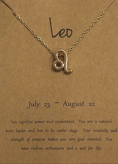 the zodiac sign necklace is on display in front of a card that says leo, july 23 - august 22