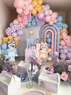 a birthday party with balloons and decorations