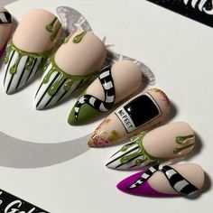 Welcome to LD Nails! 🖤 One set of 10 REUSABLE Press On Nails 🖤 🖤 Made to order in your shape & size 🖤 BG 3D: fully hand painted set with spooky French tips and tons of 3D elements! The w0rms, Drips & Sign are all 3D/Raised, created with Vo. Tino 3D Gelly. The N0 F33t photo is also 3D AND thermal! It “develops” with the heat from your finger! It will appear black when cold, and when it warms up it reveals the ghosts in the photo. There is A LOT of work that goes into this set, it is priced accordingly. ‼️‼️ This set is recommended for medium length nails and up. If you order in an X-Short or Short length, AND/OR if your set sizing is small (x-small/small) then alterations may need to be made to some details to allow them to fit, specifically the sign and photo nails. ‼️‼️ No topcoat pre Complex Halloween Nails, Simply Nailogical Nails, French Nail Fall Designs, Simple Drawings On Nails, Mismatched Halloween Nails, Painting Press On Nails Diy, Nail Art Swatches, Character Design Nail Art, Color Cheetah Nails