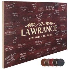 a wooden sign with the names and date for mr and mrs lawnance written on it