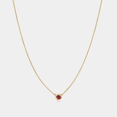 Embrace the passion and love with our Garnet Solitaire Birthstone Necklace. Its deep, rich red hue symbolizes love, friendship, and devotion. Garnet radiates energy, passion, and warmth. The perfect gift for anyone born in January. Gemstone: Natural Garnet Month: January Pendant dimensions: .21" x .21" (5.3mm x 5.3mm) Chain length: 16" (40.5cm), extends to 18" (45.5 cm) Please note, natural gemstones may vary in color. Classic Red Pendant Necklace, Classic Ruby Necklace In Yellow Gold, Classic Yellow Gold Ruby Necklace, Classic Red 14k Gold Necklace, Red Gemstone Pendant Necklace, Red Gemstone Pendant Necklaces, Luxury Ruby Necklace In Yellow Gold, Luxury Yellow Gold Ruby Necklace, Elegant Ruby Gemstone Necklace