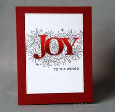 a red and white card with the word joy on it