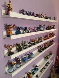 the shelves are filled with various toy figurines