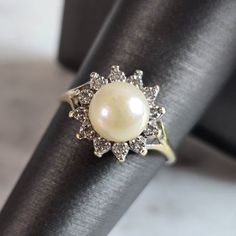 A Women's Vintage Estate 14k Gold Pearl And Diamond Ring. Pearl Is Real. There Are About .25cts. Of Diamonds. The Ring Is A Size 8.0, And Weighs 4.0g. The Width Of The Ring Is About 1/2". This Is A Beautiful, Impressive Gift For That Someone Special. Any Questions, Please Don't Hesitate To Ask. Be Sure To Check Out Some Of My Other Great Items Up For Sale. Thank You. Ring Pearl, Pearl And Diamond Ring, Unusual Jewelry, Pearl Diamond, 14k Gold Ring, Gold Pearl, Womens Jewelry Rings, Gold Ring, Diamond Ring