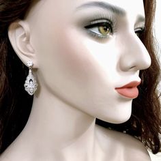 Classic Formal Chandelier Earrings With Intricate Design, Ornate Bridal Earrings For Formal Occasions, Ornate Bridal Earrings For Festive Occasions, Elegant Diamond White Bridal Earrings For Wedding, Exquisite Crystal Wedding Earrings, Diamond White Diamond Bridal Earrings For Wedding, Wedding Bridal Earrings In Diamond White, Exquisite Crystal Earrings For Wedding, Classic Bridal Earrings With Elegant Design For Party