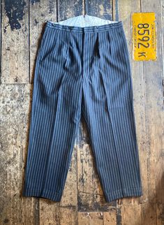 Rare Early 1930/40s A.E Grozier Of Manchester Pin Stripe Fish Tale High Waisted Trousers, Two Hand Pockets, One Back Pocket  Wear: Very good vintage condition Waist: 37 Inch Inside leg: 28 Inch  Length: 42.5 Inch Rise: 15.5 Inch  We lovingly hand pick every vintage item for its age, uniqueness, coolness and style.  Hope you like our finds. All of our items are vintage and may show signs of previous wear. Any significant wear, damage or marks will be photographed however we love a bit sunfade and Fish Tales, Pin Stripe, High Waisted Trousers, Mens Trousers, Keep Up, Brighton, Manchester, Mens Pants, Art Collection