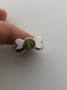 Rich bright Peridot green ring Sterling silver Tarnished with age, can be polished up. Size 7 can be sized by my jeweler. His service charge is $10-$20 All rings are shipped free in the US in a nice gift box. Check out our over a THOUSAND great reviews Engraving is $4 per letter and is not always perfect depending on the piece. It can take a few days if the jeweler is busy. This is payable to Paypal Judithsltd@gmail.com Lime Green Sterling Silver Promise Ring, Lime Green Sterling Silver Rings As Gift, Lime Green Sterling Silver Rings For Gift, Lime Green Sterling Silver Birthstone Rings, Peridot Rings In Lime Green As Gift, Green Gemstone Sterling Silver Birthstone Ring, Lime Green Peridot Rings For Gift, Lime Green Peridot Rings For Gifts, Green Sterling Silver Open Ring