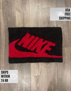 a pair of nike rugs on the floor with price tags for each piece and description