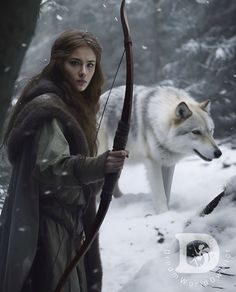 a woman holding a bow and arrow in the snow with a wolf standing behind her