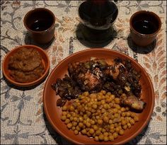 the meal is prepared and ready to be eaten on the table with two coffee mugs